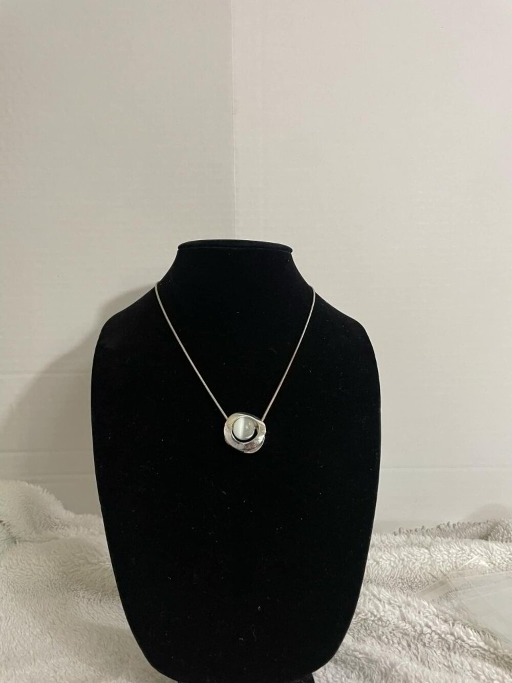 Silver-Toned Necklace With White Cat's Eye Stone Pendant